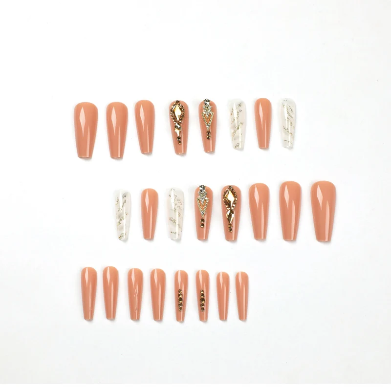Artful nail extensions with glitter embellishments and delicate accents Stornfield