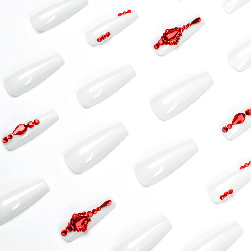 Artful nail extensions with glitter accents and elegant embellishments Stornfield