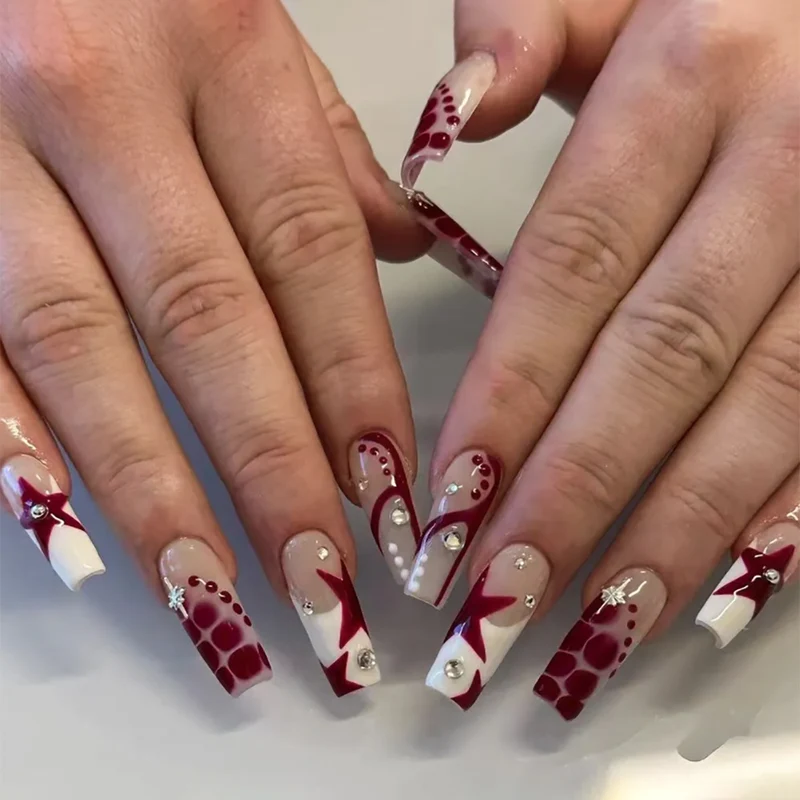 Artful Nail Extensions with Glitter and Star Motifs Stornfield