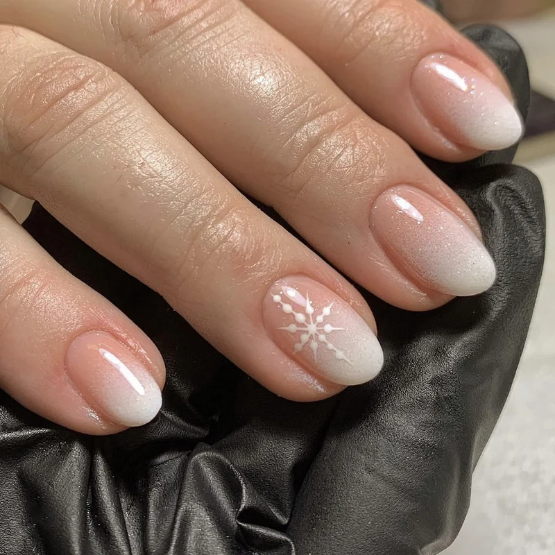 Artful Nail Extensions with Glitter and Snowflake Design Stornfield