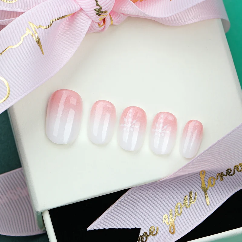 Artful Nail Extensions with Glitter and Snowflake Design Stornfield