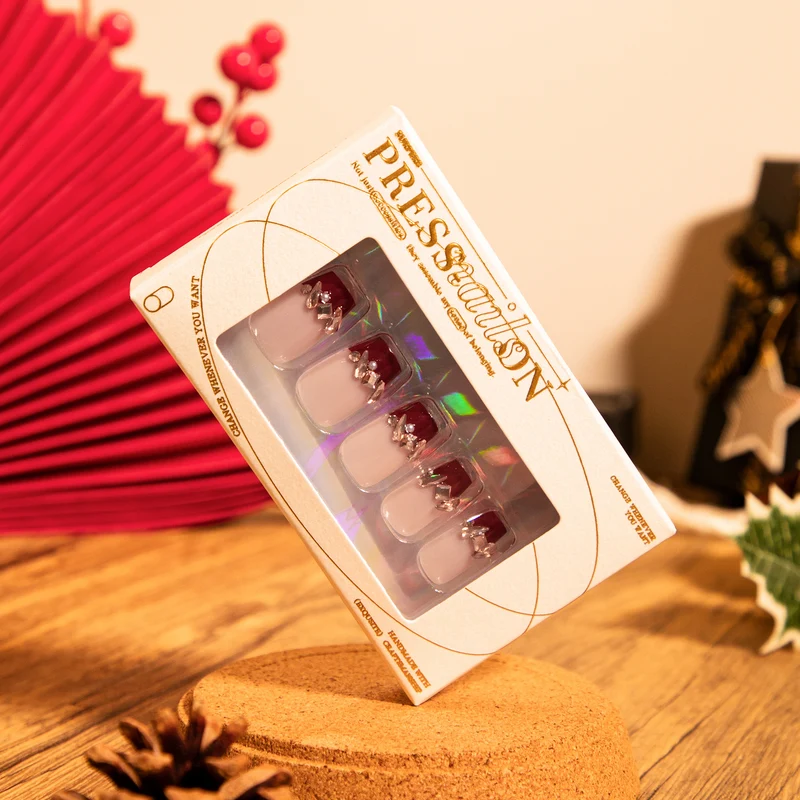 Artful nail extensions with glitter and jewelry embellishments Stornfield