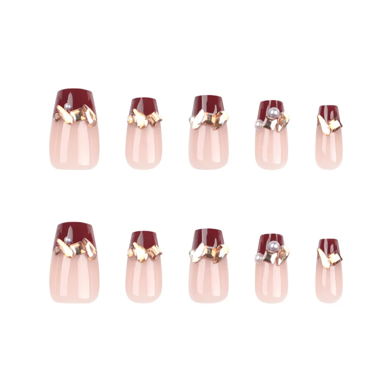 Artful nail extensions with glitter and jewelry embellishments Stornfield
