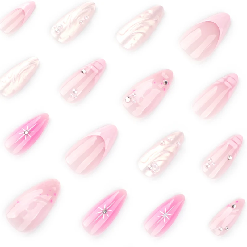 Artful Nail Extensions with Glitter and Shell Motifs Stornfield