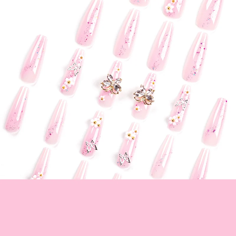 Artistic Nail Extensions with Glitter and Floral Accents Stornfield
