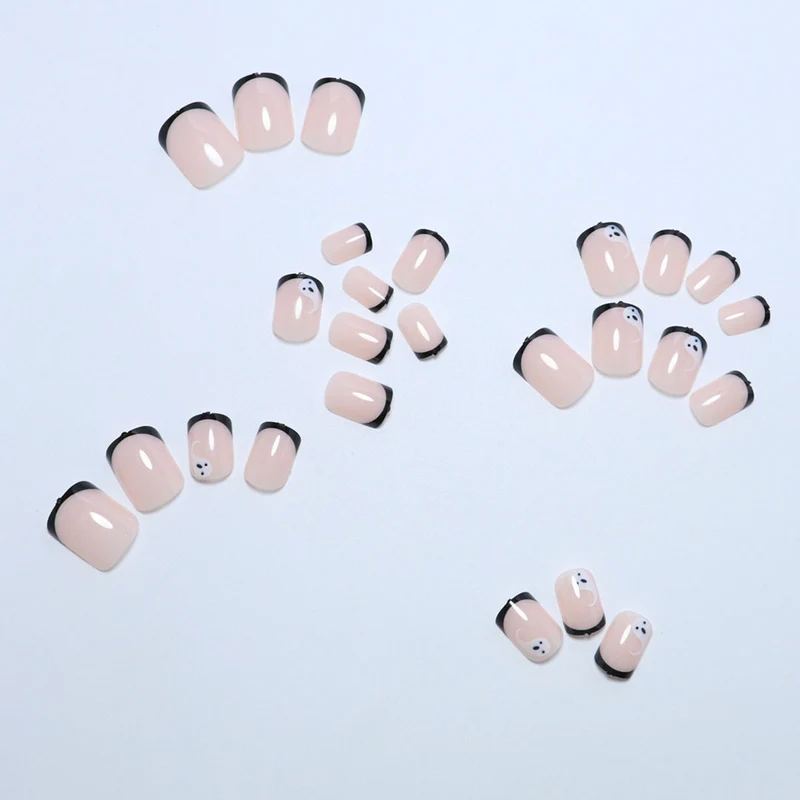 Artistic Ghost-Themed Press-On Nail Art Stornfield