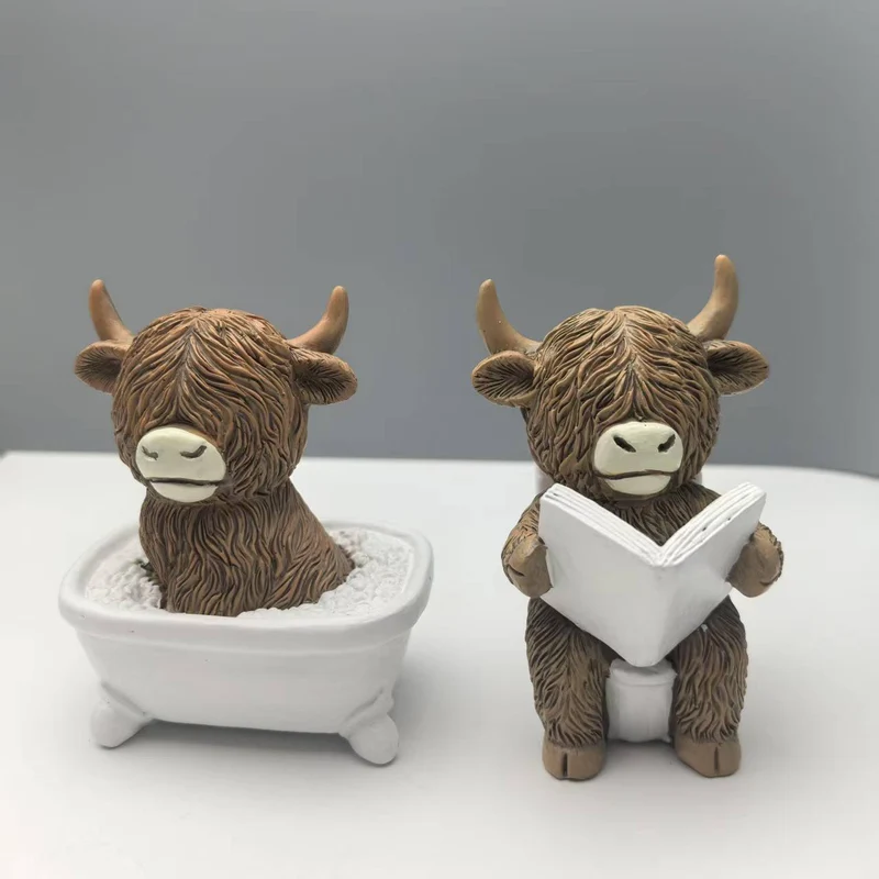 Funny decorative figure of a Highland cow in a bathtub Stornfield