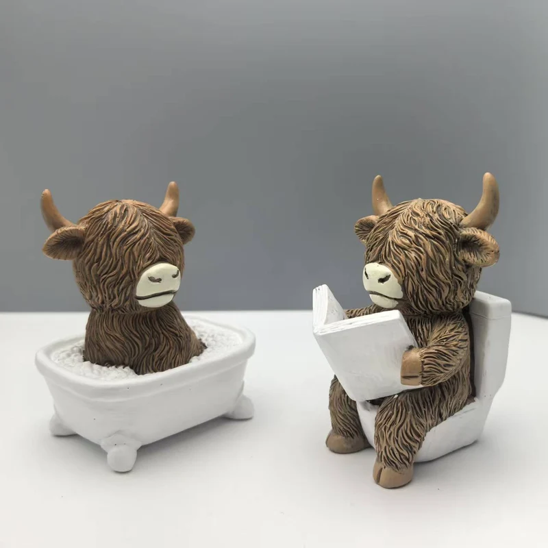 Funny decorative figure of a Highland cow in a bathtub Stornfield
