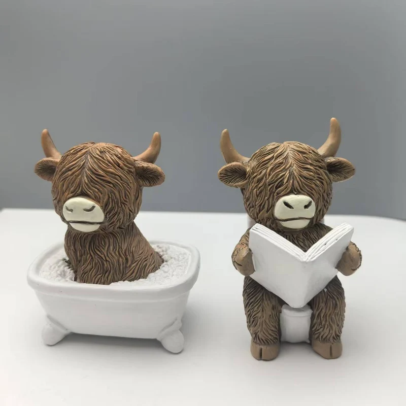 Funny decorative figure of a Highland cow in a bathtub Stornfield