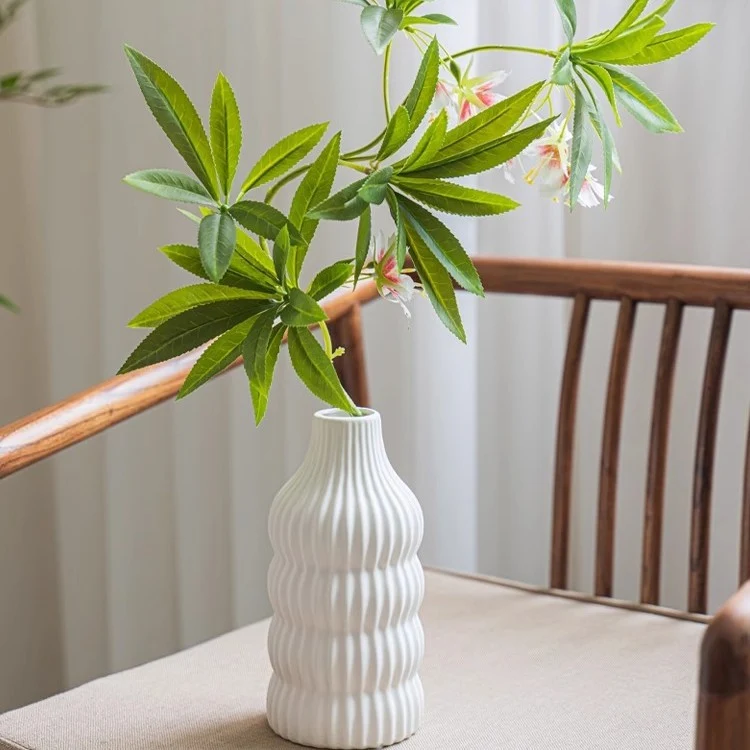 Stylish ceramic vase with wave structure Stornfield