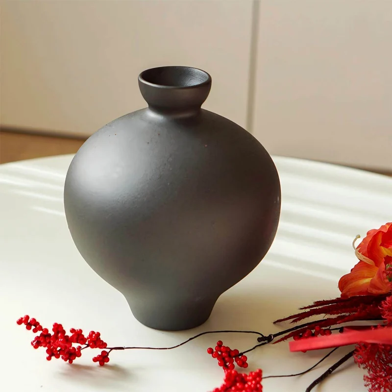 Artistic ceramic vase with organic shape Stornfield