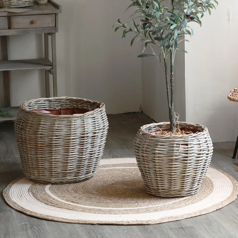 Stylish laundry basket made of braided natural material Stornfield