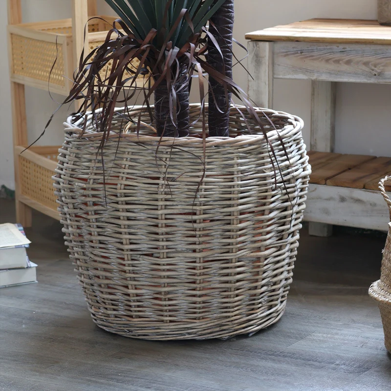 Stylish laundry basket made of braided natural material Stornfield