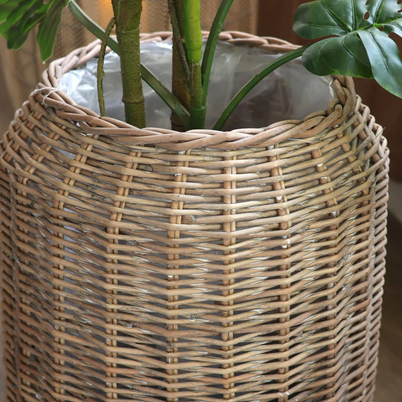 Stylish laundry basket made of braided natural material Stornfield