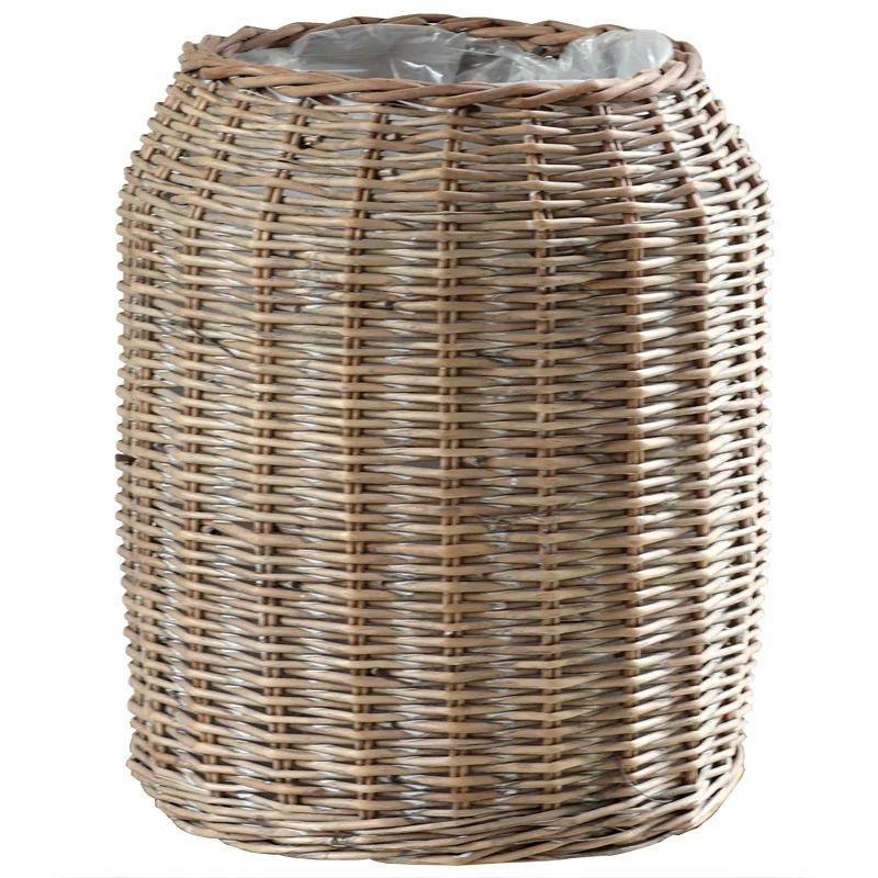 Stylish laundry basket made of braided natural material Stornfield