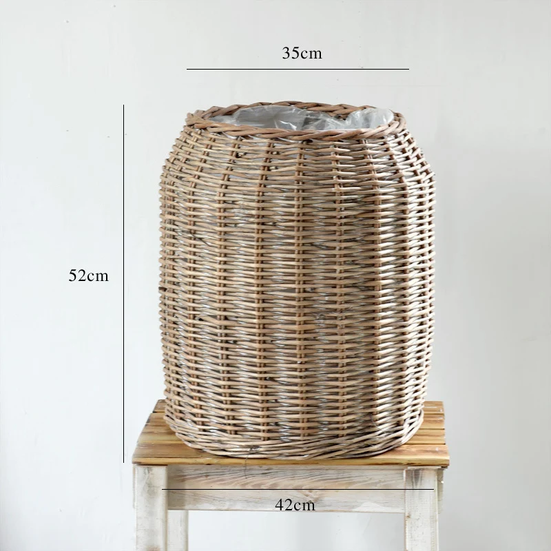 Stylish laundry basket made of braided natural material Stornfield