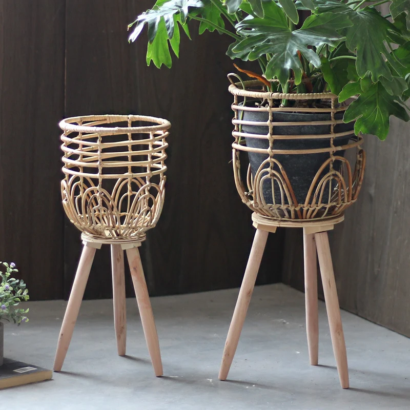 Stylish plant stand made of rattan and wood Stornfield