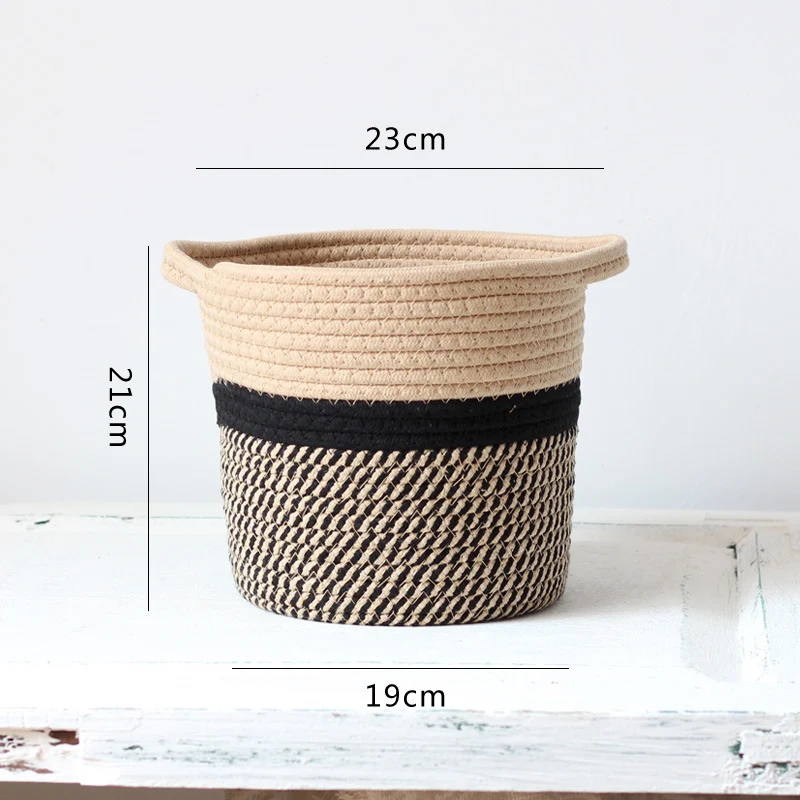 Handcrafted storage basket with handles Stornfield