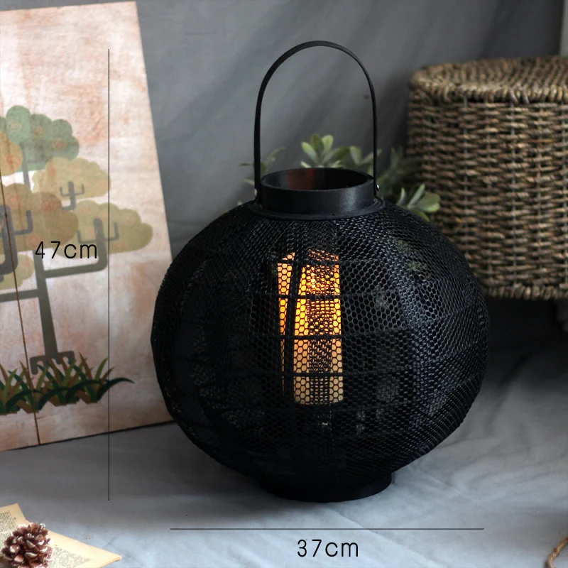 Elegant metal lantern with net design Stornfield