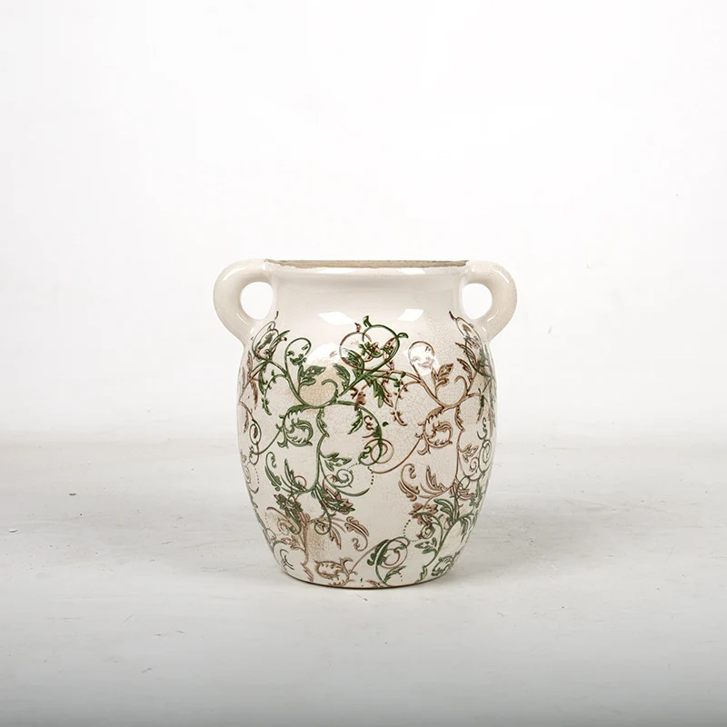 Decorative plant pot with floral accents Stornfield