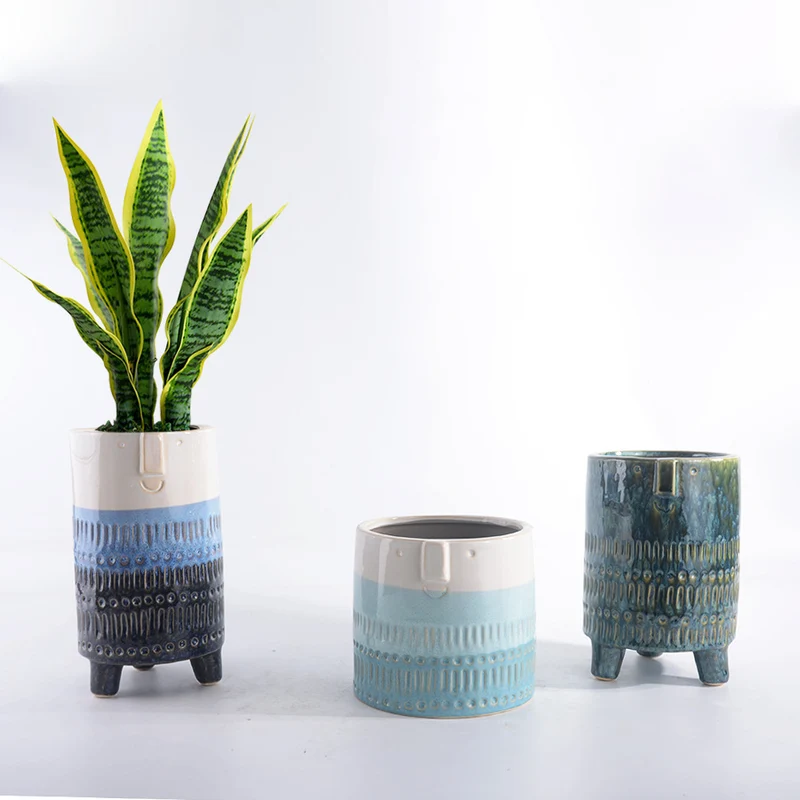 Decorative plant pot with facial features Stornfield