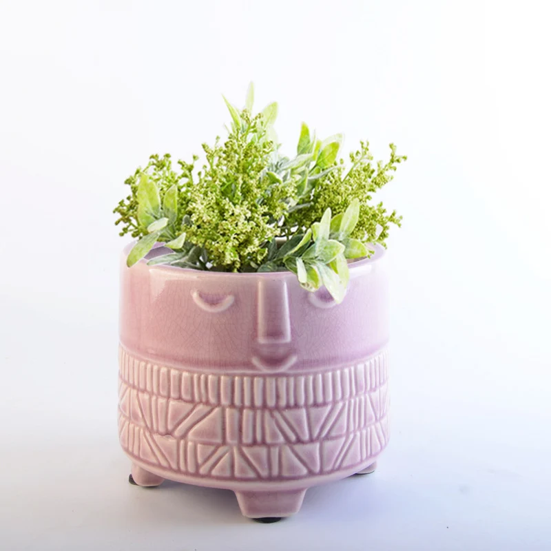 Decorative plant pot with facial features Stornfield