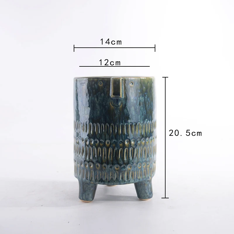 Decorative plant pot with facial features Stornfield