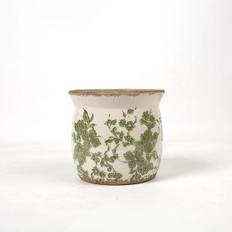 Decorative ceramic plant container with artistic design Stornfield