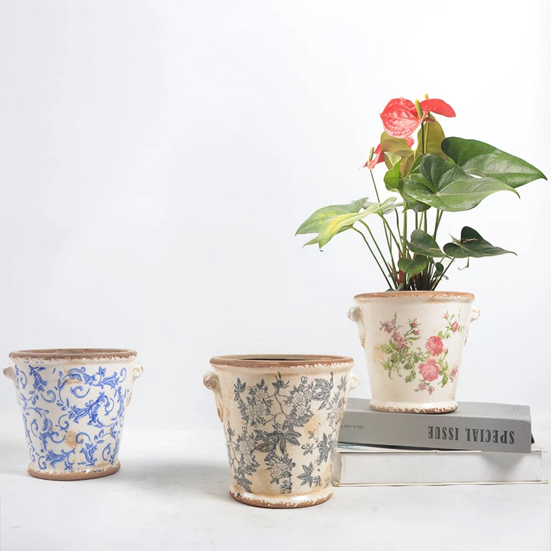 Decorative flower pot with floral embellishments Stornfield