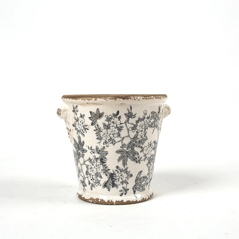 Decorative flower pot with floral embellishments Stornfield