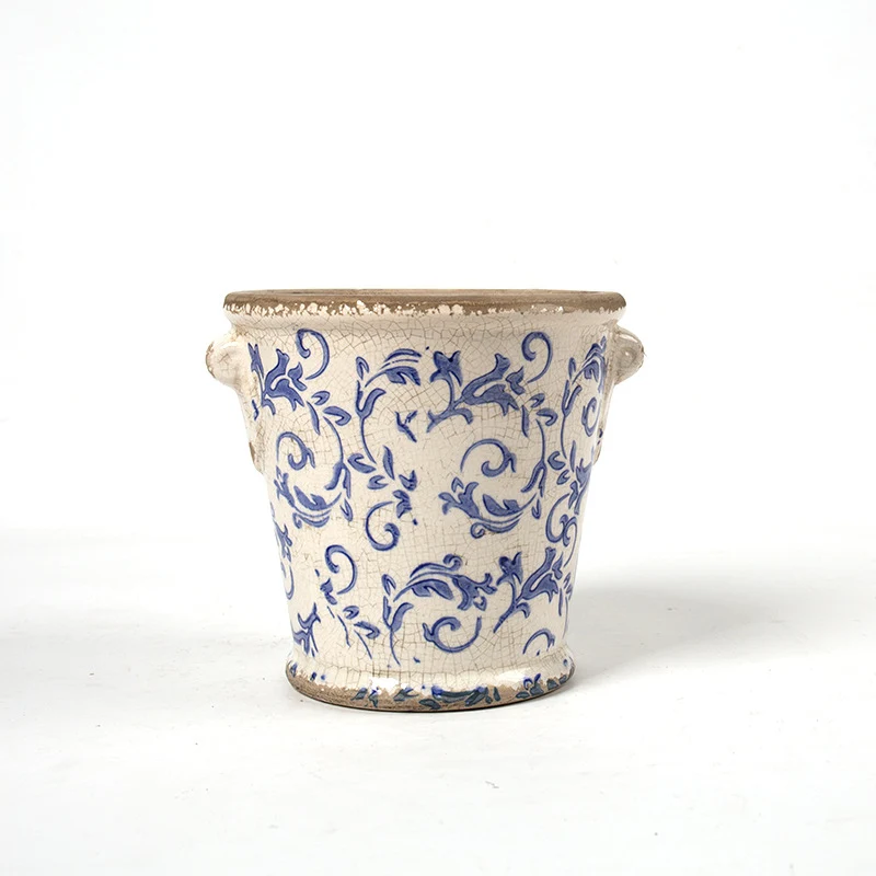 Decorative flower pot with floral embellishments Stornfield