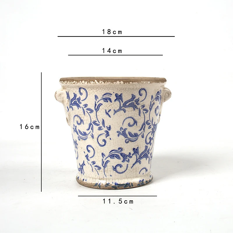 Decorative flower pot with floral embellishments Stornfield