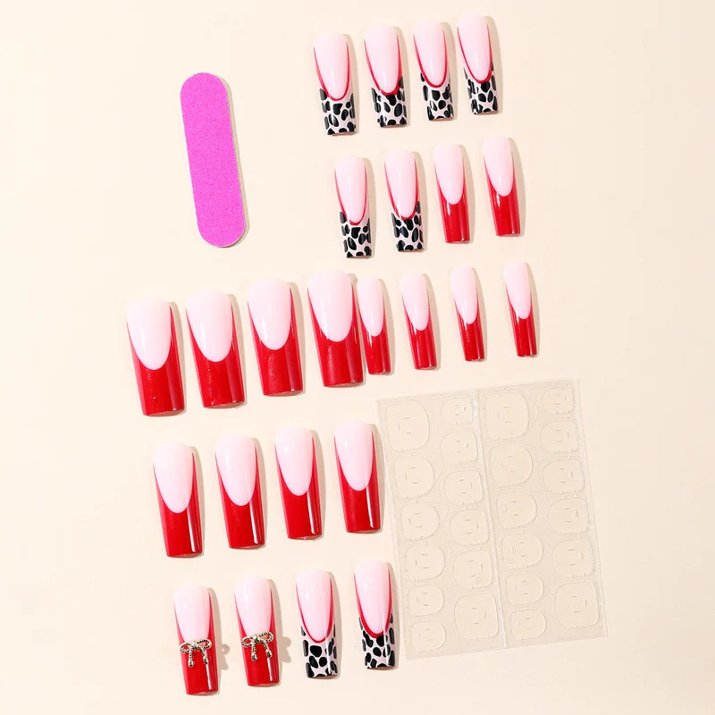 Stylish Acrylic Nail Extensions with Bow and Leopard Print Stornfield
