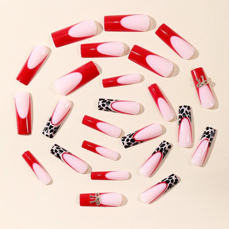 Stylish Acrylic Nail Extensions with Bow and Leopard Print Stornfield