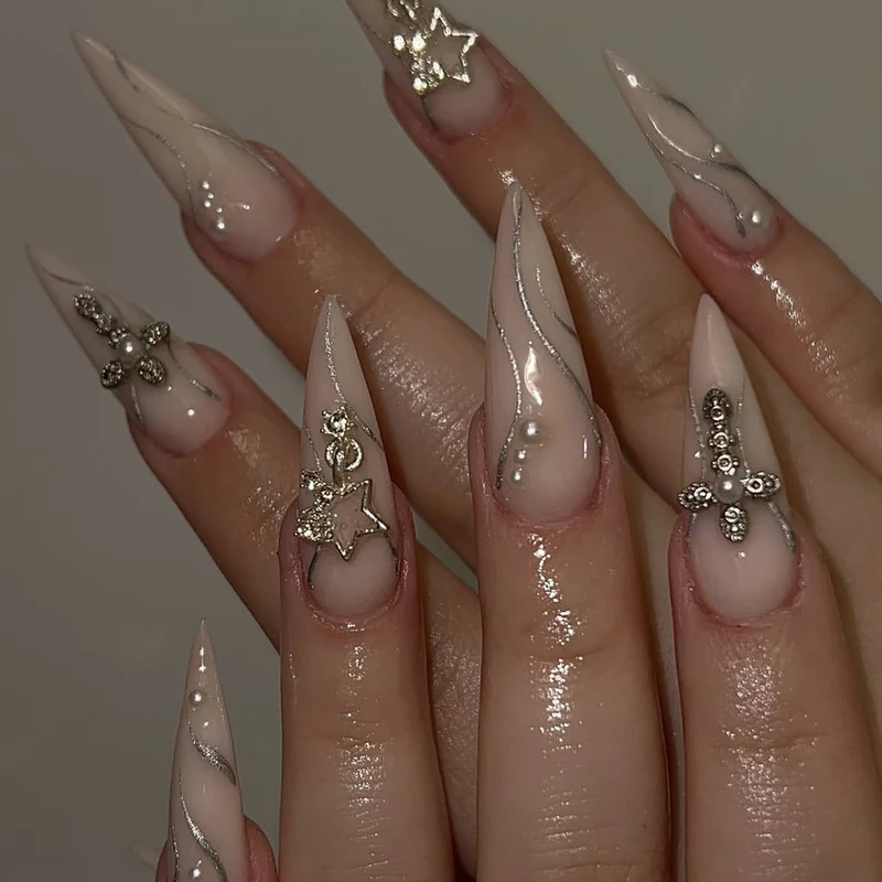 Stiletto Acrylic Nail Art Extensions with Decorative Accents Stornfield