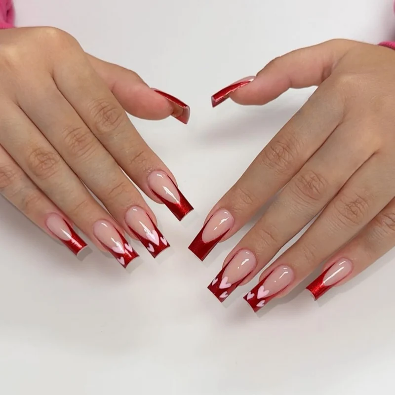 Heart-Patterned Acrylic Nail Art Extensions Stornfield