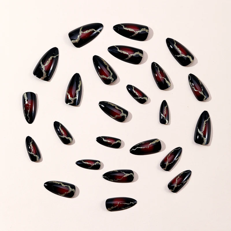 Glossy Stiletto Nail Art Extensions with Gold Accents Stornfield