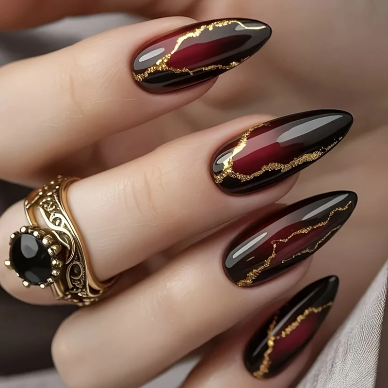 Glossy Stiletto Nail Art Extensions with Gold Accents Stornfield