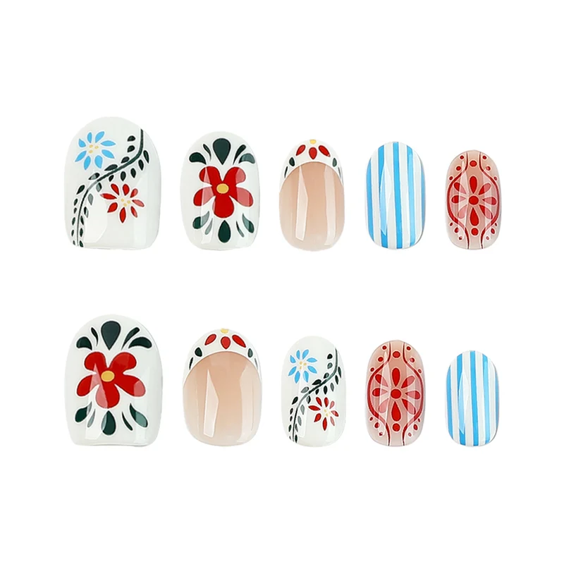 Kunstvolle Nagelkunst mit floralem Design und bunten Mustern Karnz
