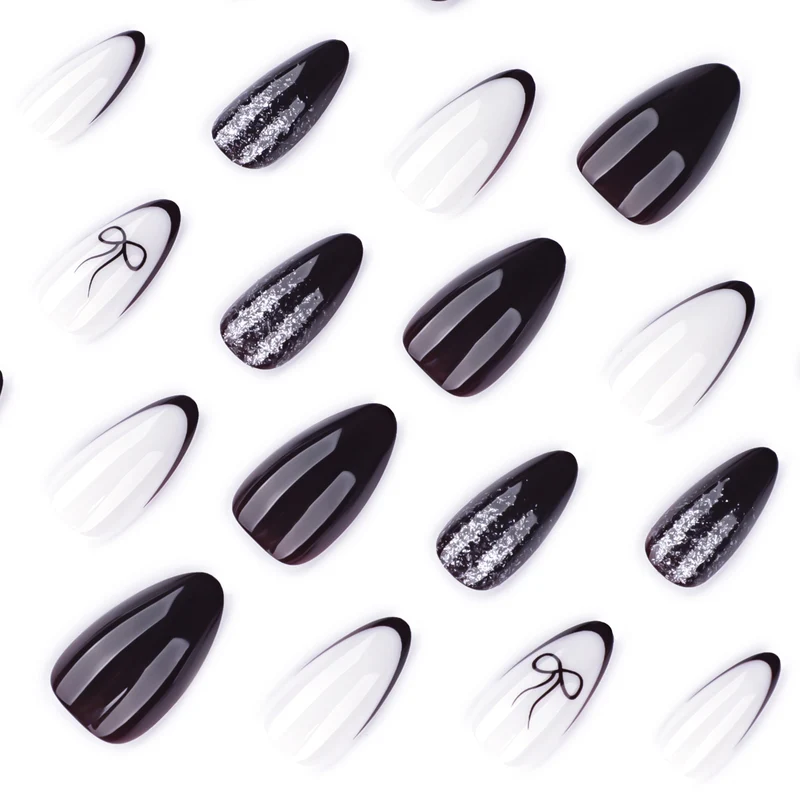 Kunstvolle Nagelkunst mit elegantem Schleifenmuster und Glitzer akzenten Karnz