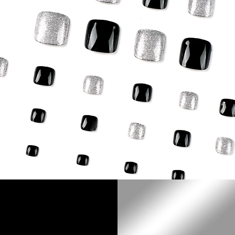 Kunstvolle Fußnagelkunst mit Glitzer- und Schwarzdesign Karnz