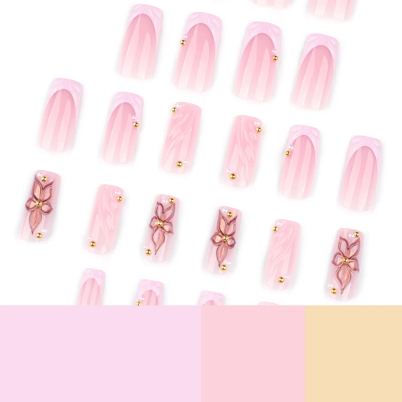Kunstvolle Acryl-Nägel mit Blumendesign und Glitzervariationen Karnz