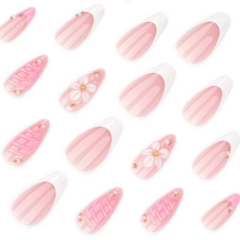 Künstliche Nagelkunst mit Floral-Design und Glitzerakzenten Karnz