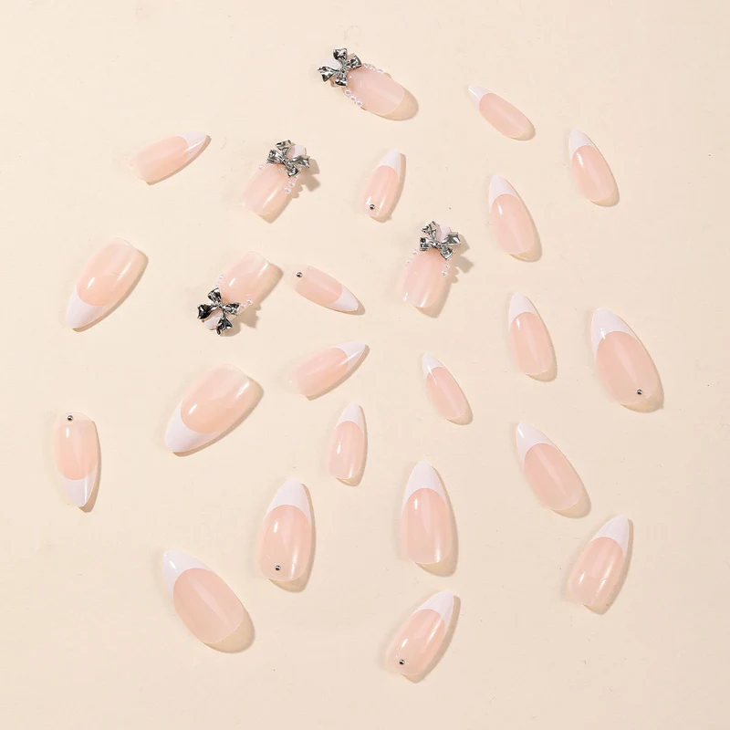 Elegant Stiletto Nail Art with Rhinestone Accents Stornfield