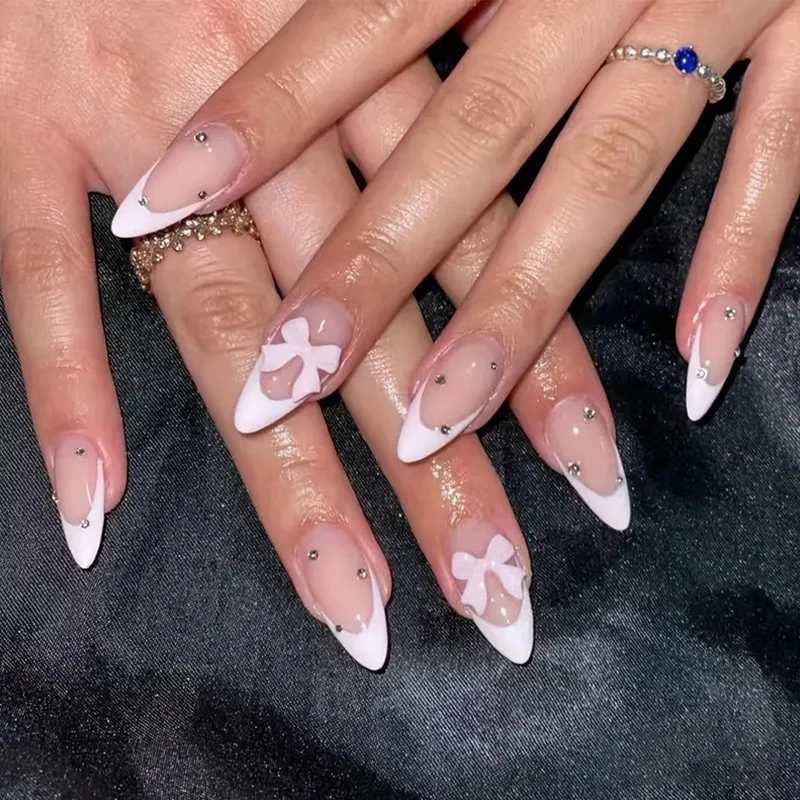Elegant Stiletto Nail Art with Floral Designs Stornfield