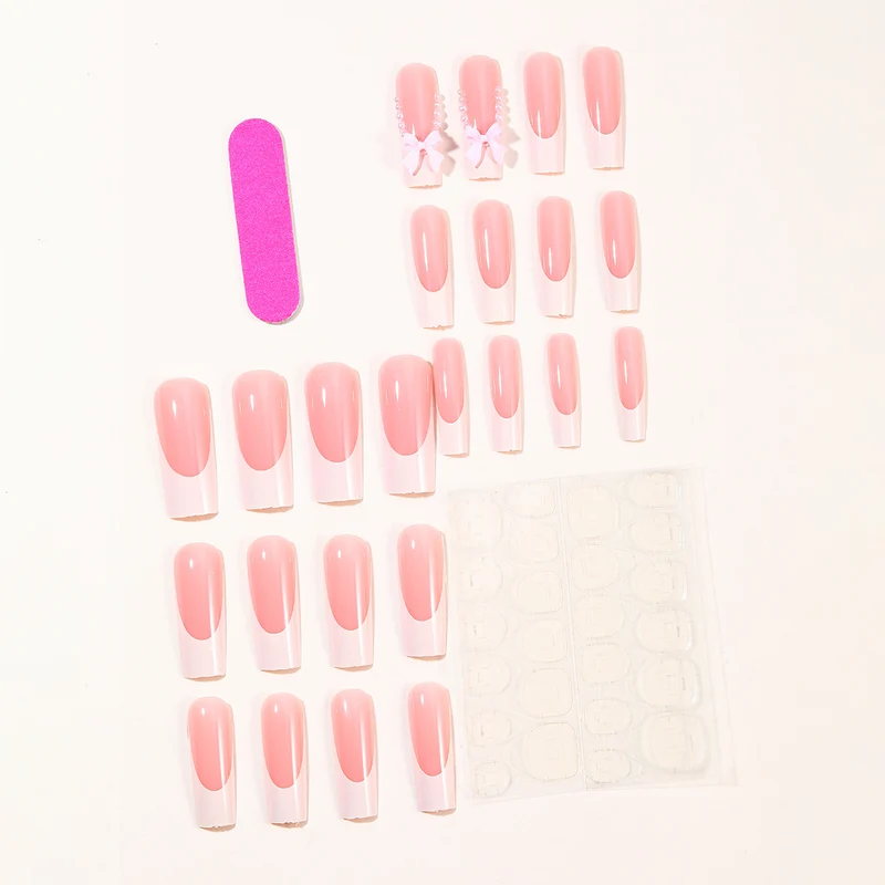 Elegant Stiletto Nail Art Extensions with Pearl and Bow Accents Stornfield