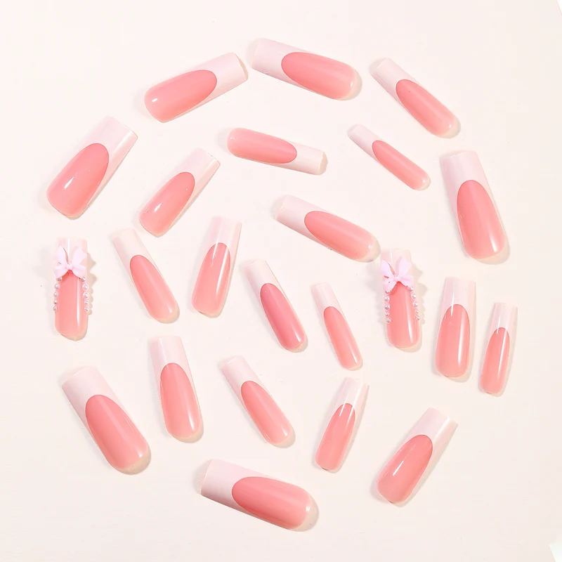 Elegant Stiletto Nail Art Extensions with Pearl and Bow Accents Stornfield