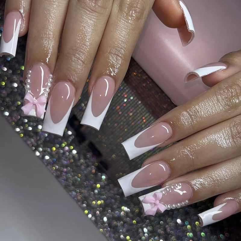 Elegant Stiletto Nail Art Extensions with Pearl and Bow Accents Stornfield