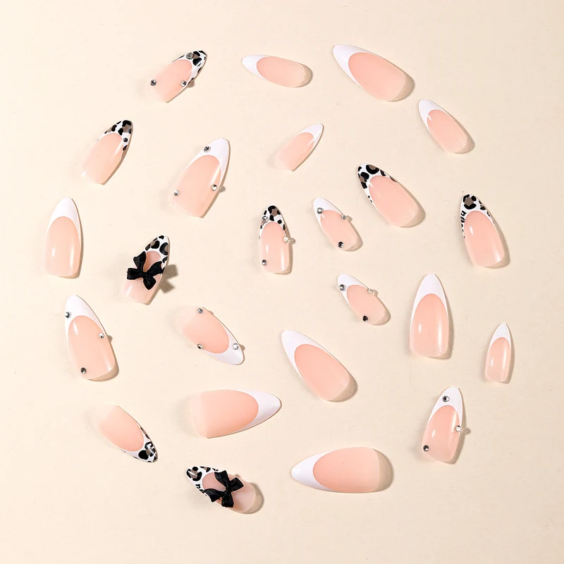 Elegant Stiletto Nail Art Extensions with Decorative Bows Stornfield