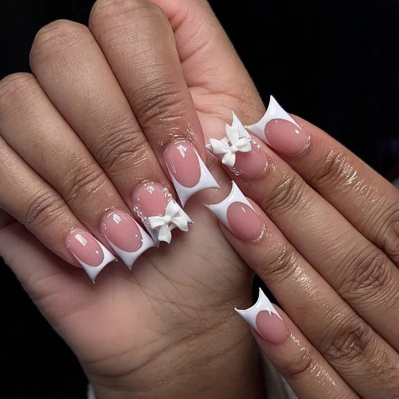 Elegant Stiletto Nail Art Extensions with Bow Accents Stornfield